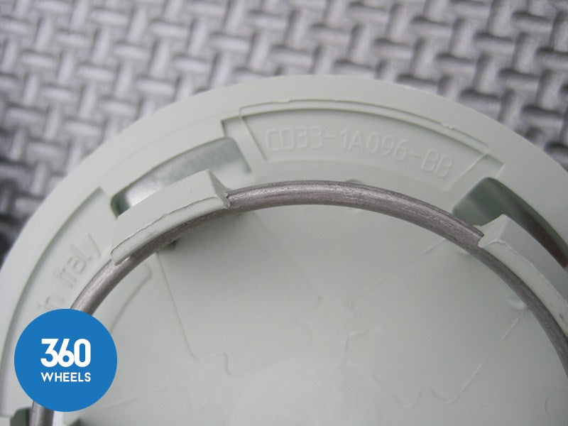 Genuine Aston Martin Centre Caps Gloss Black with Green Logo CD33-1A096-B