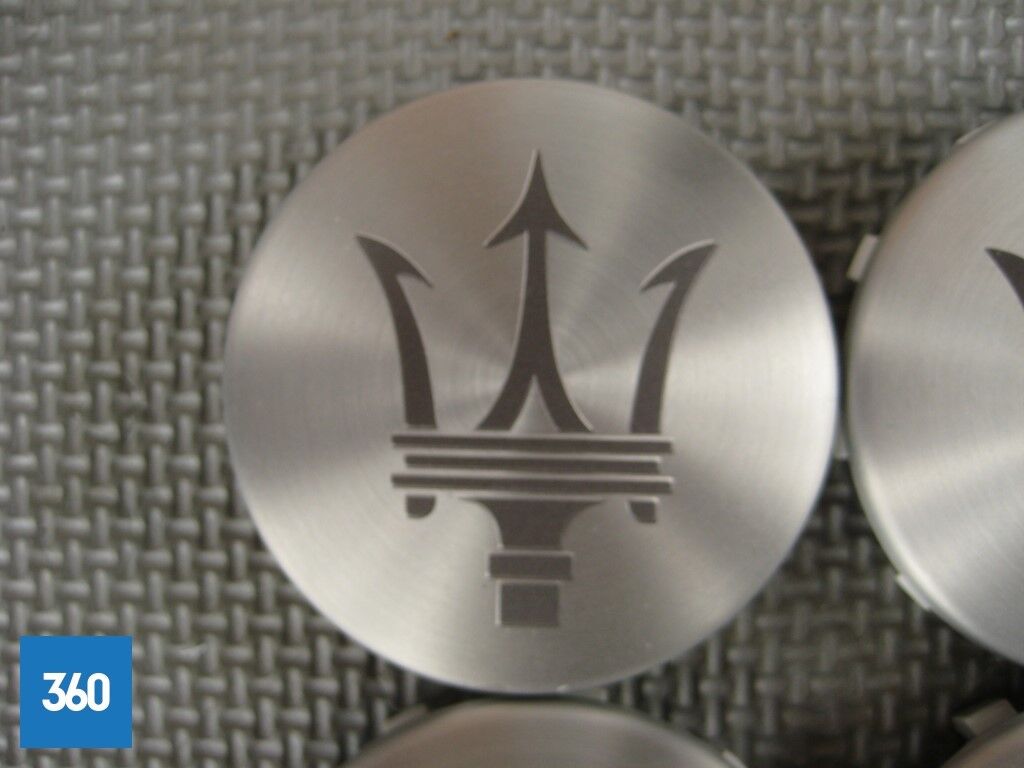 Genuine Maserati Matt Silver Centre Cap with Dark Grey Trident Logo 670025651